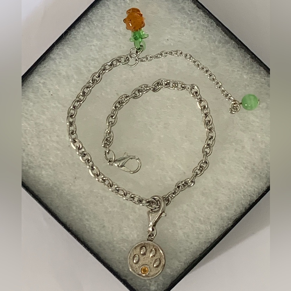 925 sterling silver bear paw pendant
 Bracelet with Orange and Green Bead